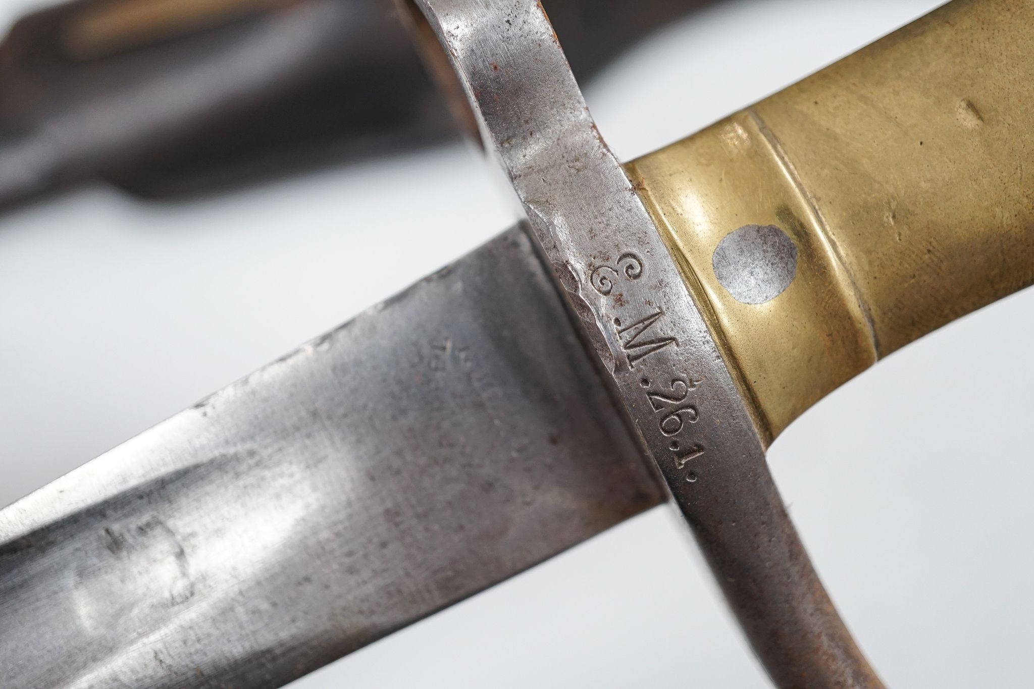 A French bayonet and scabbard with matching serial number (38804) and inscription and date to back of blade (1879) and another Solingen bayonet and scabbard
